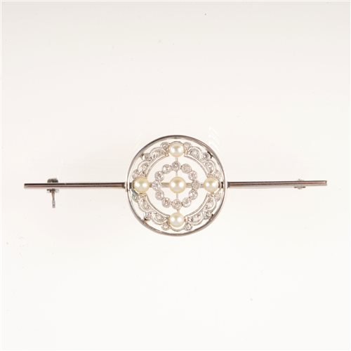Lot 61 - A diamond and pearl set bar brooch with 20mm...