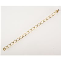 Lot 78 - An 18 carat yellow gold hollow oval curb link...