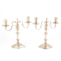 Lot 111 - Pair of George II style silver two-light...