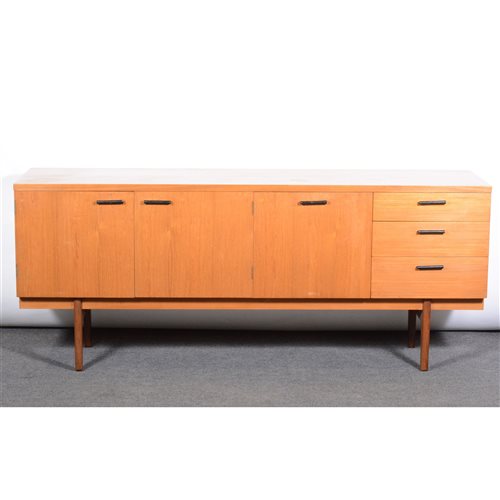 Lot 450 - A teak low-profile sideboard, by Uniflex, with...