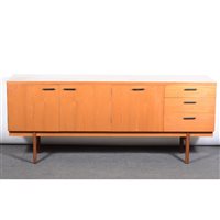 Lot 450 - A teak low-profile sideboard, by Uniflex, with...