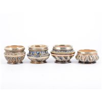 Lot 363 - Doulton Lambeth, four stoneware salts,...