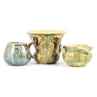 Lot 380 - C.H. Brannam, three Barum Ware pottery vases,...