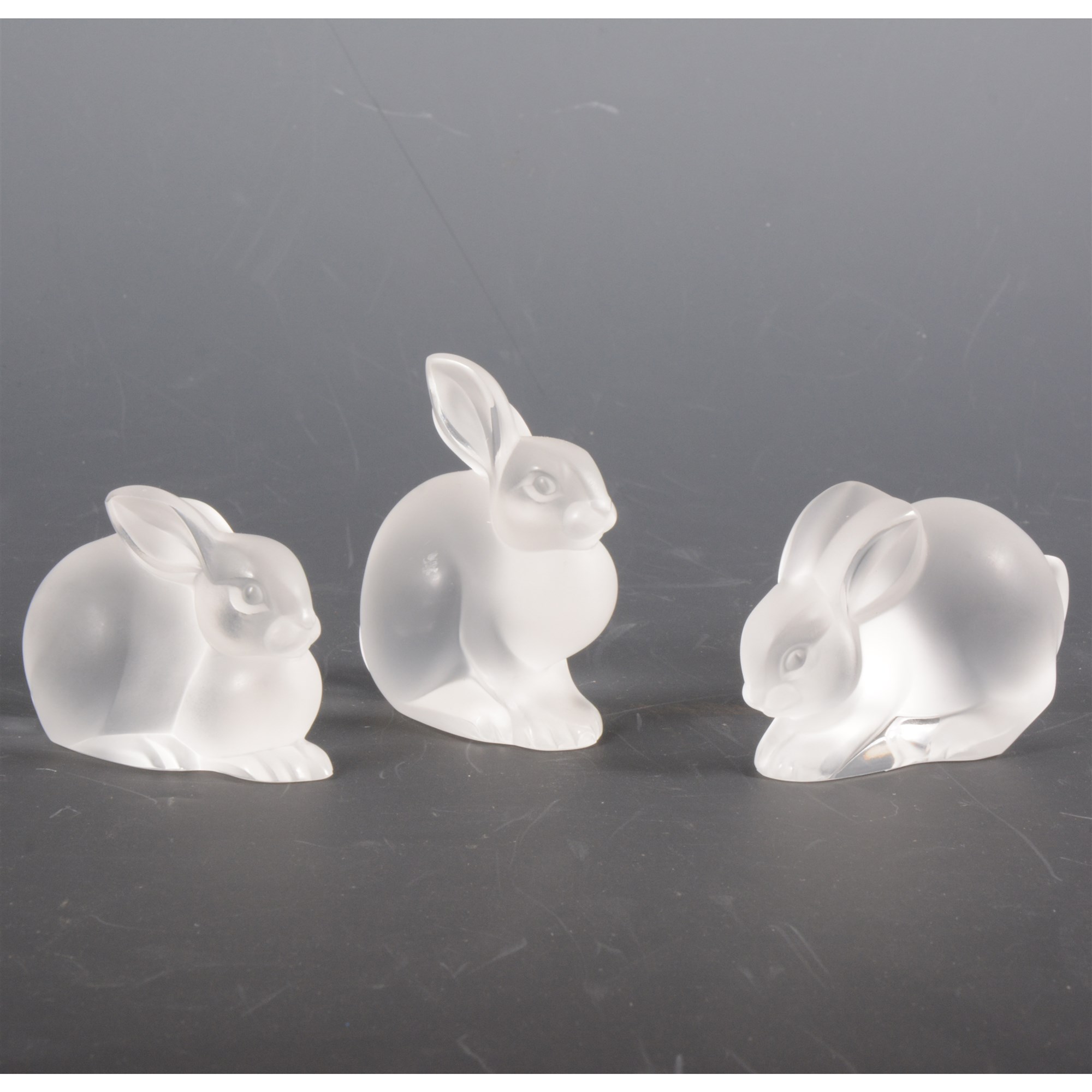 Lot 422 - Lalique Crystal, three glass rabbit