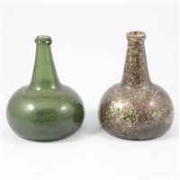 Lot 69 - Green glass onion shape bottle, with patchy...