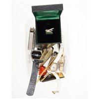 Lot 218 - Four wrist watches, key rings, cigarette...