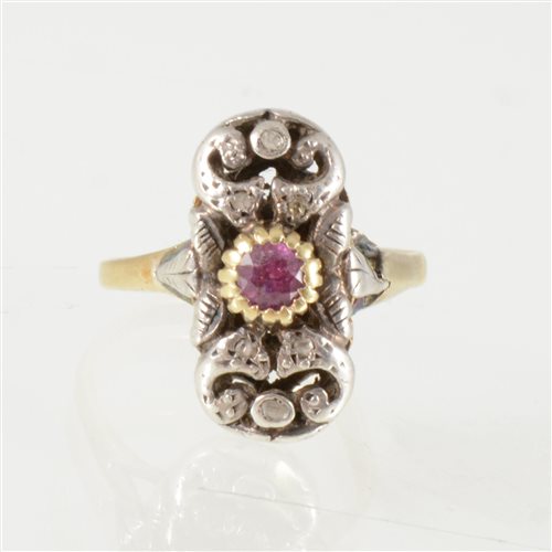Lot 197 - A ruby and diamond scroll design dress ring, a...
