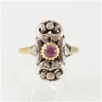 Lot 197 - A ruby and diamond scroll design dress ring, a...
