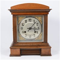 Lot 127 - An Edwardian walnut cased mantel clock,...