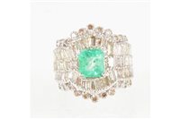 Lot 259 - An emerald and diamond fancy dress ring, a...