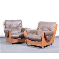 Lot 425 - Pair of teak framed and leatherette armchairs