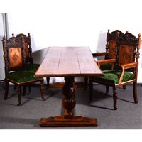 Lot 496 - Oak dining suite, the chairs with arched and...