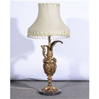 Lot 468 - French gilt metal table lamp, designed as a...