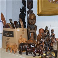 Lot 164 - A collection of African carvings and figures,...