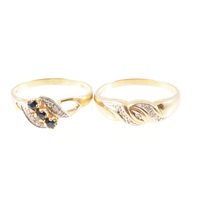 Lot 258 - Two diamond set dress rings, both marked 585...