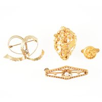 Lot 291 - Four gold coloured brooches, one set with a...