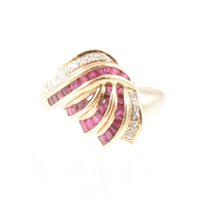 Lot 247 - A ruby and diamond dress ring, the square cut...