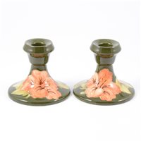 Lot 60 - Pair of Moorcroft dwarf candlesticks, Hibiscus...