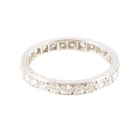 Lot 234 - A diamond full eternity ring, twenty-three...