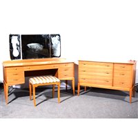 Lot 464 - Alfred Cox walnut four-piece bedroom suite,...