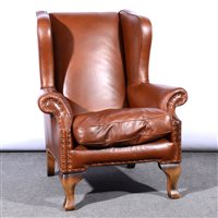 Lot 449 - Traditional style wing-back easy chair,...