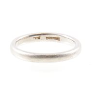 Lot 224 - A platinum wedding band, 2.8mm wide plain...