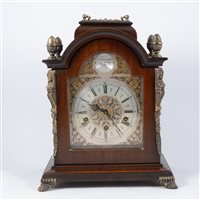 Lot 126 - A reproduction stained wood bracket clock,...