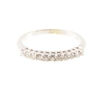 Lot 237 - A diamond half eternity ring, eleven brilliant...