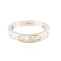 Lot 236 - A diamond half eternity ring, eight princess...