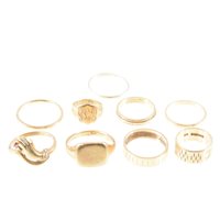 Lot 226 - Nine 9 carat yellow gold rings, wedding and...