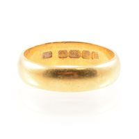 Lot 225 - A 22 carat yellow gold wedding band, 5.5mm...