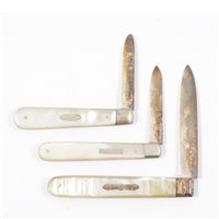 Lot 385 - Three mother-of-pearl fruit knives with silver...