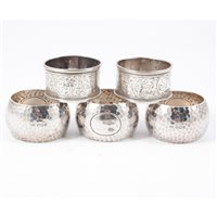 Lot 376 - Five silver napkin rings, three 30mm wide D...