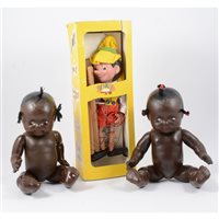 Lot 181 - Pair of black dolls and Pinocchio pelham puppet.