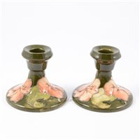 Lot 47 - Pair of Moorcroft dwarf candlesticks, Hibiscus...