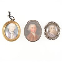 Lot 280 - Three oval portrait miniatures of Georgian...