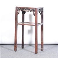 Lot 465 - Chinese carved hardwood two-tier stand, ...