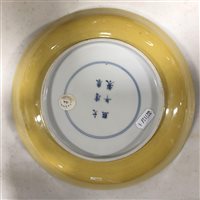 Lot 25 - Chinese yellow ground circular dish, bearing...