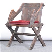 Lot 377 - A Victorian carved oak cleric seat, pegged...