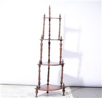 Lot 398 - Victorian walnut four-tier corner whatnot,...