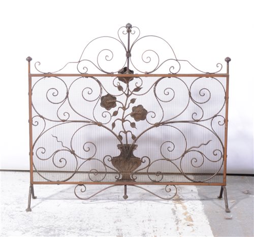 Lot 414 - Wrought iron and mesh fire guard, width 75cm.