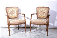 Lot 433 - A pair of French beech fauteuils.