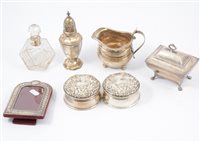 Lot 253 - Silver sugar box, Edward Barnard & Sons Ltd London 1912, raised on four lion paw feet width 10cm, sarcophagus shape, Regency milk jug, London 1815, 13.05 oz t [9].