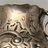 Lot 76 - George III silver helmet-shape cream jug, maker's mark M?, London, 1764.