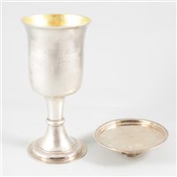 Lot 119 - George II silver chalice and paten, London, 1744.