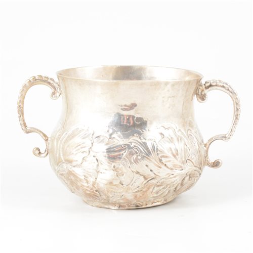 Lot 97 - Charles II silver two-handle small porringer, maker's mark RL or KL with pellet under, possibly 1661.