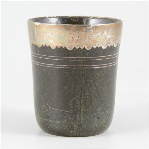 Lot 67 - Turned hardstone beaker, with a white metal rim, probably 18th century.