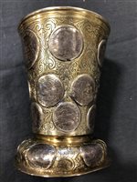 Lot 49 - German silver parcel gilt beaker, set with 18th century coins.