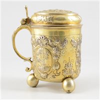Lot 63 - Russian silver gilt lidded tankard, maker's marks SV and Cyrillic MC, Moscow, 18th Century.