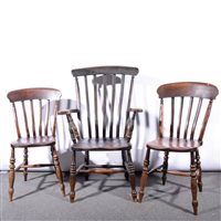 Lot 329 - Four Windsor slat-back chairs and an elbow chair